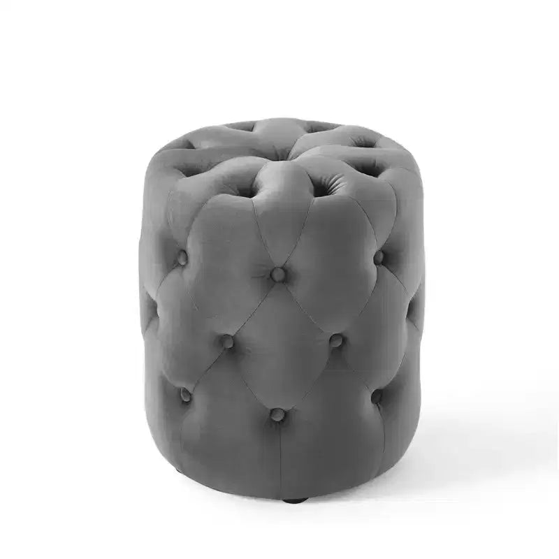 Pouf rond capitonné en velours performant