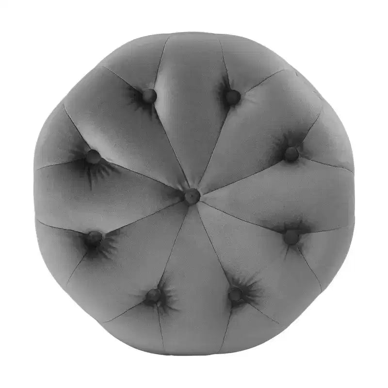 Pouf rond capitonné en velours performant
