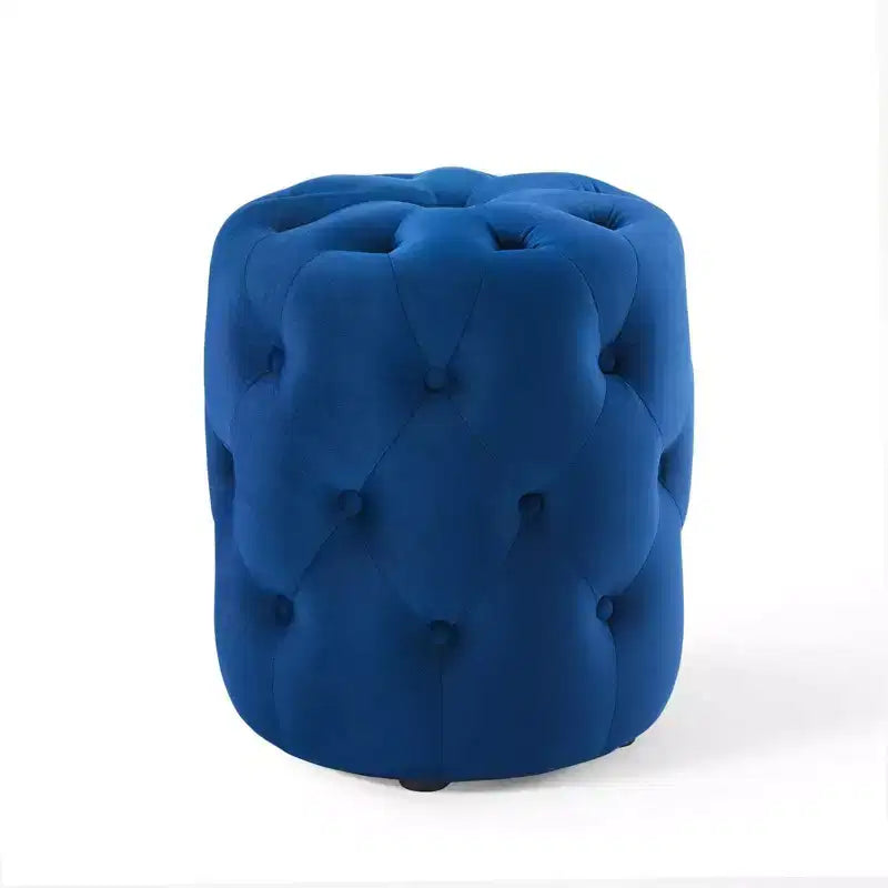Pouf rond capitonné en velours performant