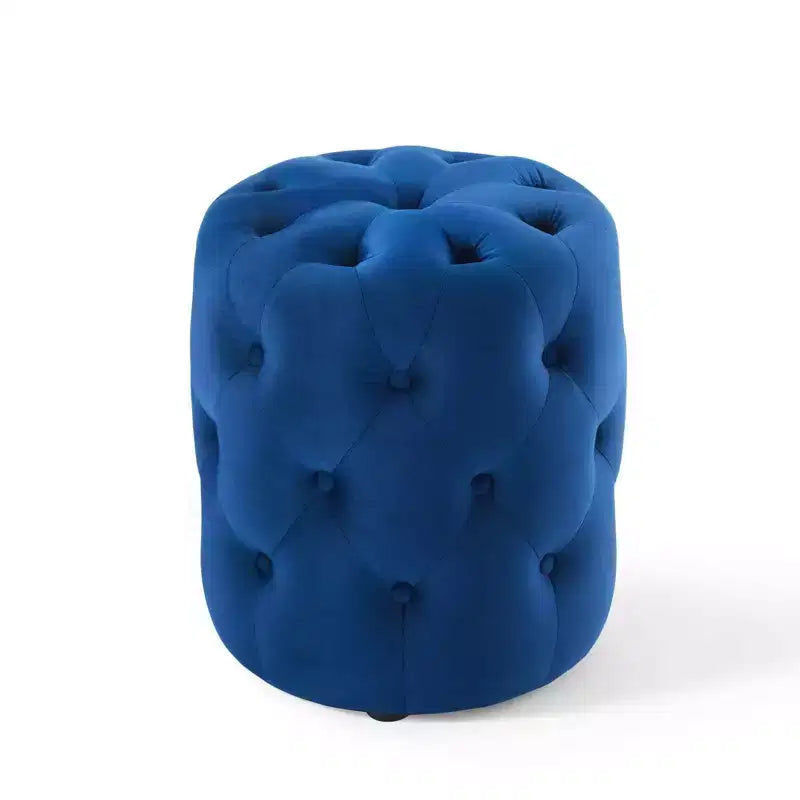 Pouf rond capitonné en velours performant