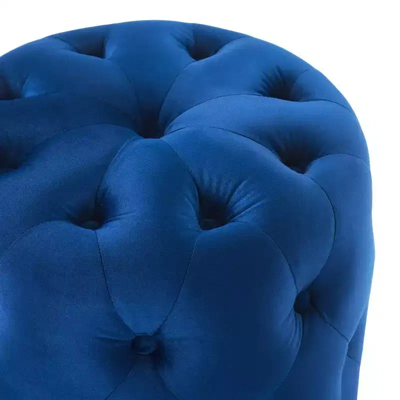 Pouf rond capitonné en velours performant