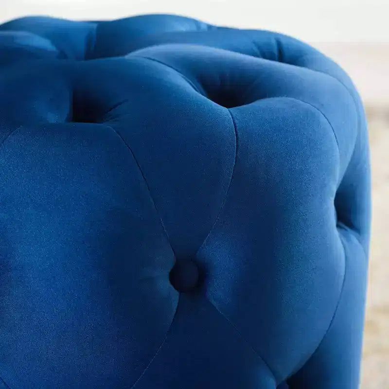 Pouf rond capitonné en velours performant
