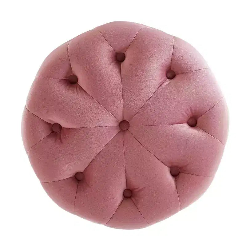 Pouf rond capitonné en velours performant