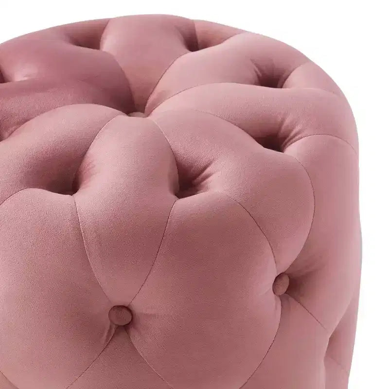 Pouf rond capitonné en velours performant