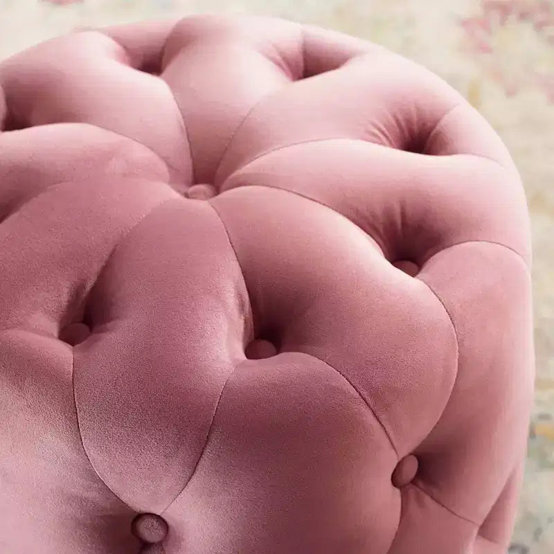 Pouf rond capitonné en velours performant