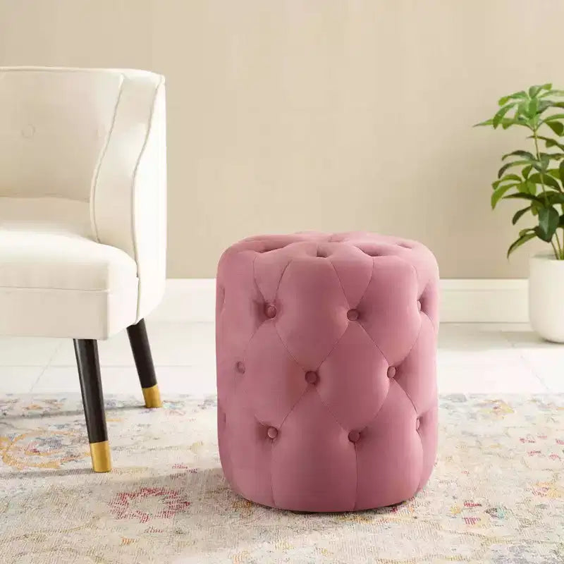 Pouf rond capitonné en velours performant
