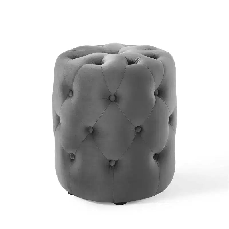 Pouf rond capitonné en velours performant
